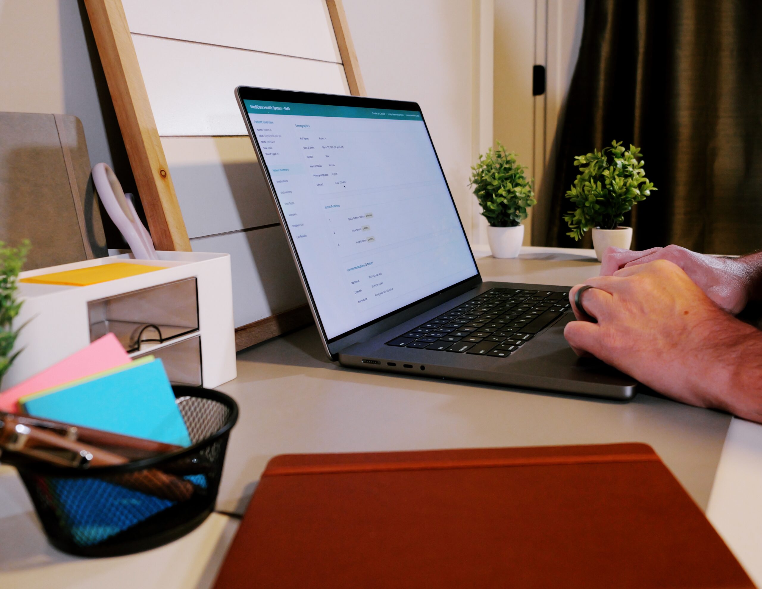 Middle Aged Man Checking His Electronic Medical Records - EMR at Home Concept